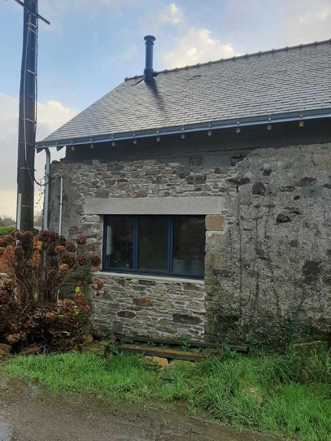 Ouverture mur en pierre pour fenêtre